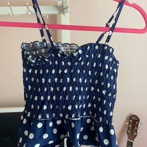 Blue and white polka dot cropped top